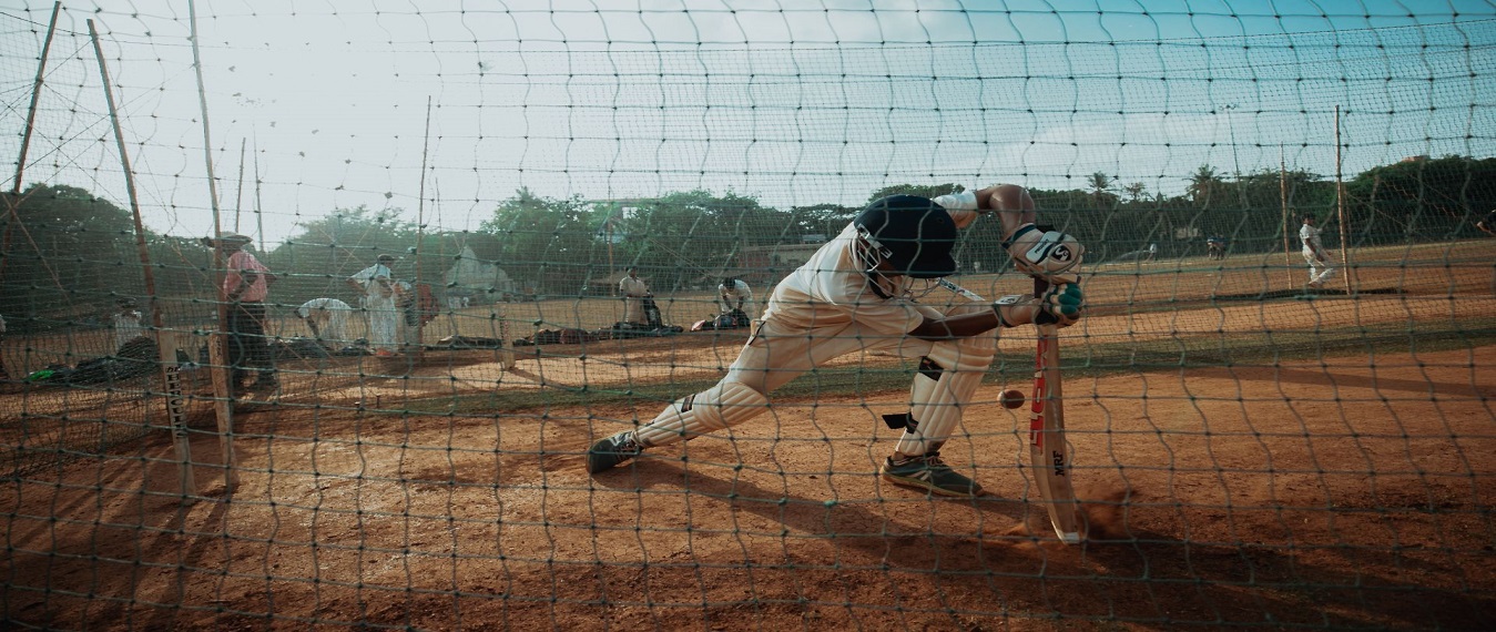 Batsman diving at the crease during cricket practice